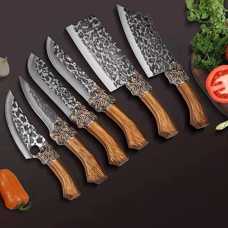 El juego de cuchillos de chef forjados Signature